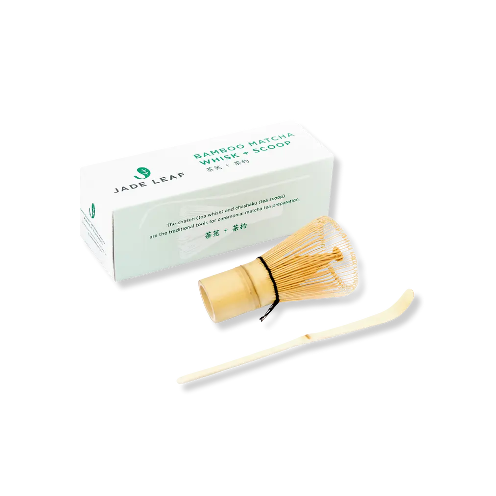 Bamboo matcha whisk and curved scoop beside a Jade Leaf box