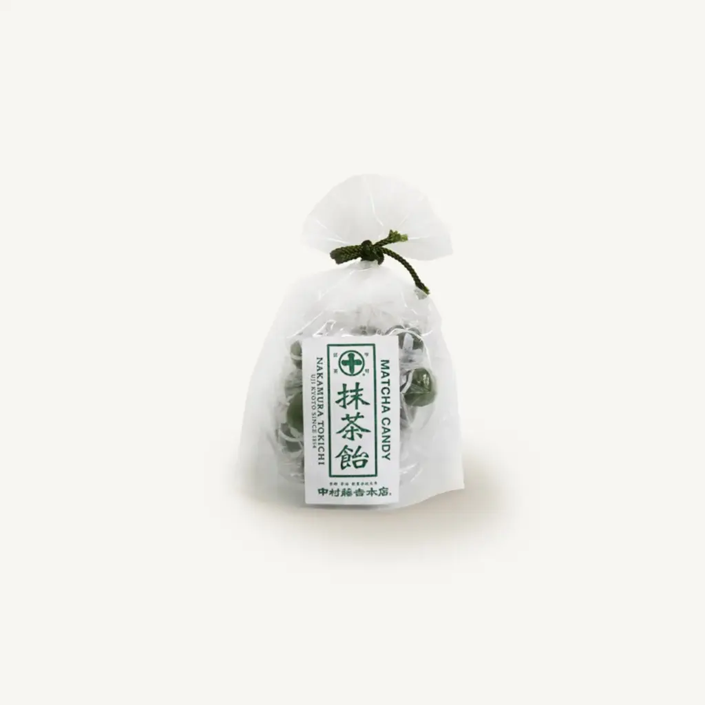 Clear bag of green matcha hard candies tied with a dark green cord, front label reading Matcha Candy and Nakamura Tokichi