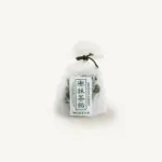 Clear bag of green matcha hard candies tied with a dark green cord, front label reading Matcha Candy and Nakamura Tokichi