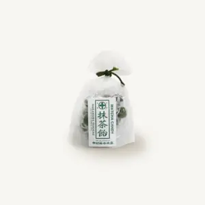 Clear bag of green matcha hard candies tied with a dark green cord, front label reading Matcha Candy and Nakamura Tokichi