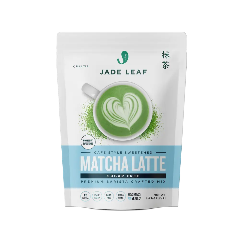 Front of a Jade Leaf Sugar-Free Matcha Latte Mix pouch with a green latte and heart-shaped foam art