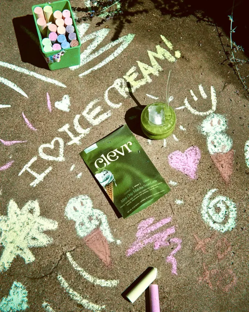 Clevr Mint Chip Matcha SuperLatte package and green iced drink surrounded by chalk drawings