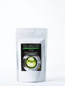 Silver Tea Master pouch labeled 100% Matcha Powder for Deluxe Latte
