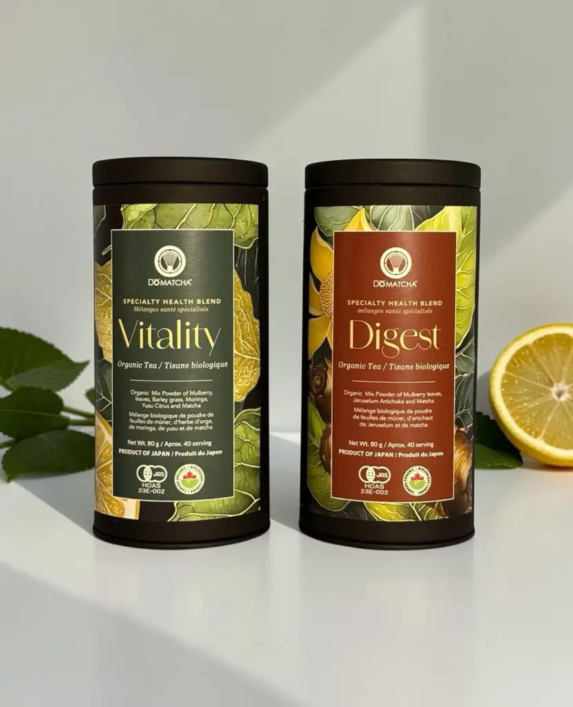 Do Matcha Vitality and Digest tins beside green leaves and a halved lemon