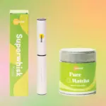Golde Pure Matcha tin beside a white Superwhisk and its green box
