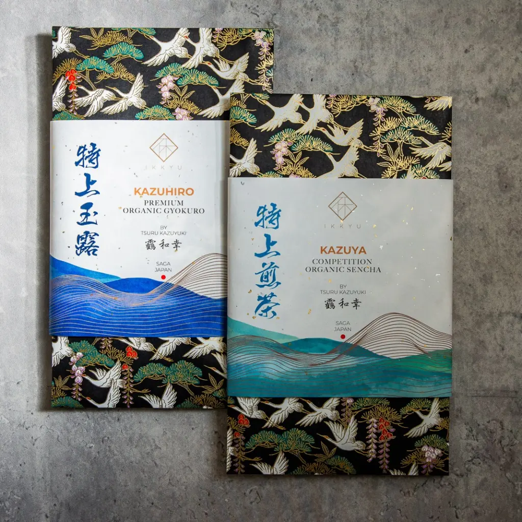 Kazuhiro gyokuro and Kazuya sencha packages with crane and pine designs