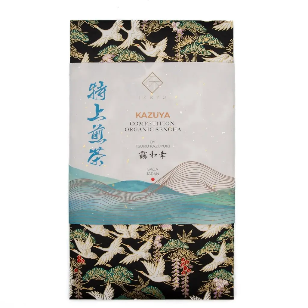 Kazuya sencha package with cranes, pine branches, flowers, and blue wave patterns