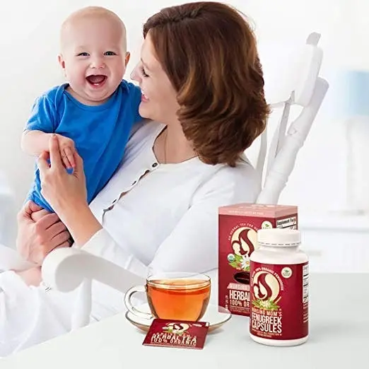 Woman holding a smiling baby beside herbal tea and capsule packaging