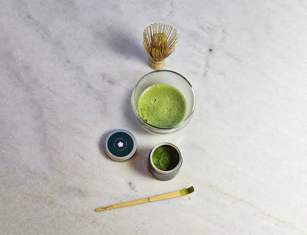 Mamatcha Set (Pure) with prepared matcha, bamboo whisk, scoop, and open tin of green powder