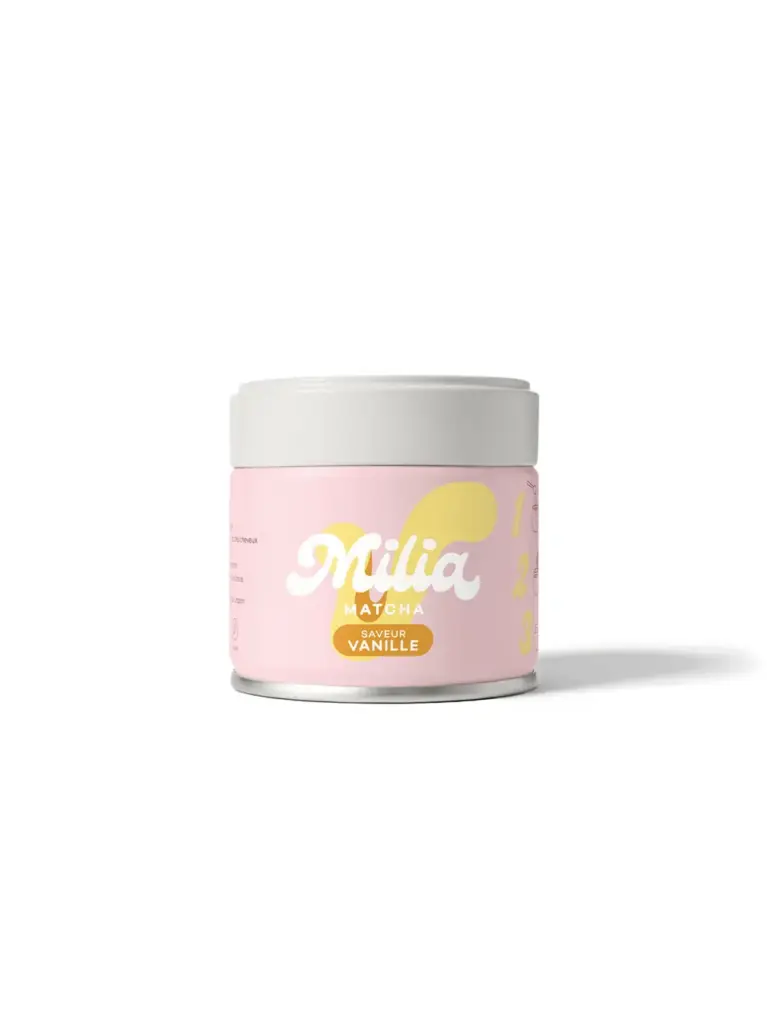 Pink Milia Matcha tin with a white lid and vanilla flavor label