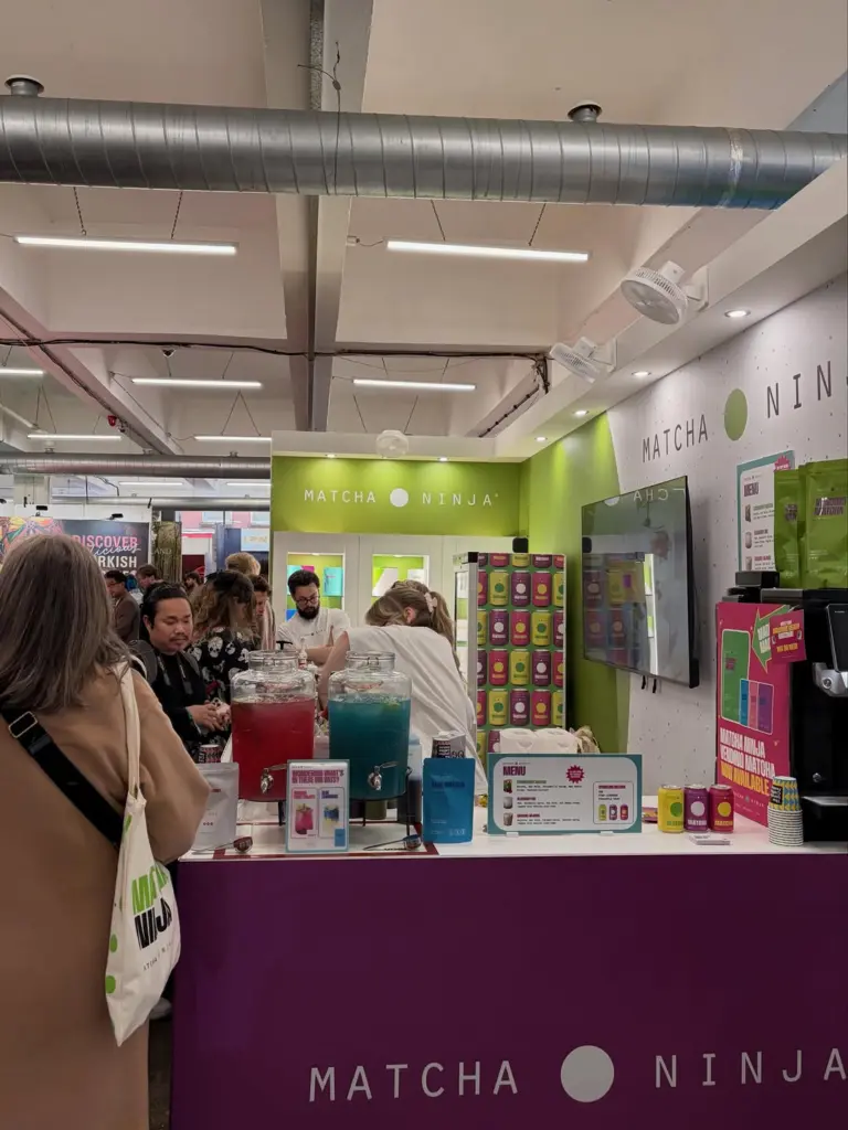 Matcha Ninja booth counter with red and blue drink dispensers