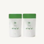Two white and green Nakamura Tokichi Matcha Starter pouches