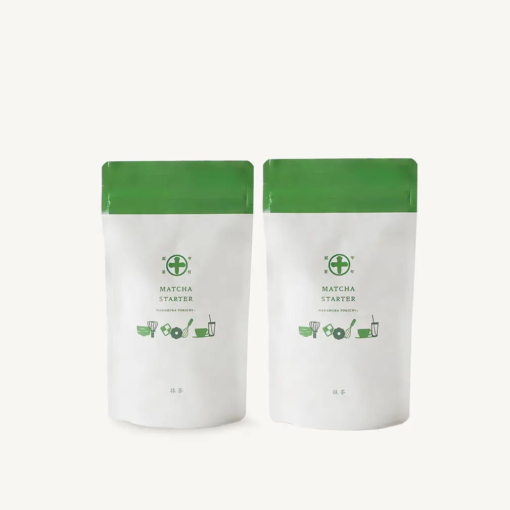 Two white and green Nakamura Tokichi Matcha Starter pouches