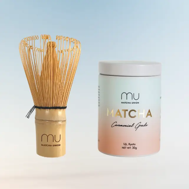 Bamboo whisk beside a Matcha Union Ceremonial Grade Matcha 30g tin
