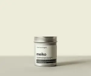 Silver Matchaeologist Meiko matcha tin with a white label and screw-top lid