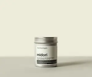 Silver Matchaeologist Midori culinary matcha tin with a white label and screw-top lid