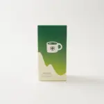 Green and cream MIXCHA Matcha & Milk box with a white cup graphic