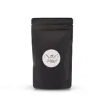Front view of a black resealable Moba Matcha pouch with a round white logo label