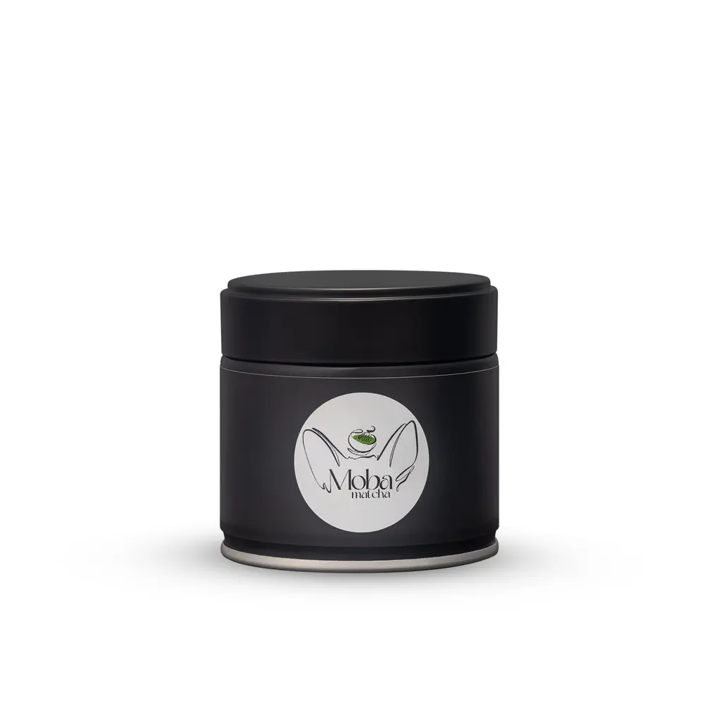 Black Moba Matcha tin with lid and white circular logo label