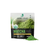 Front of a Jade Leaf culinary matcha pouch with green powder beside it