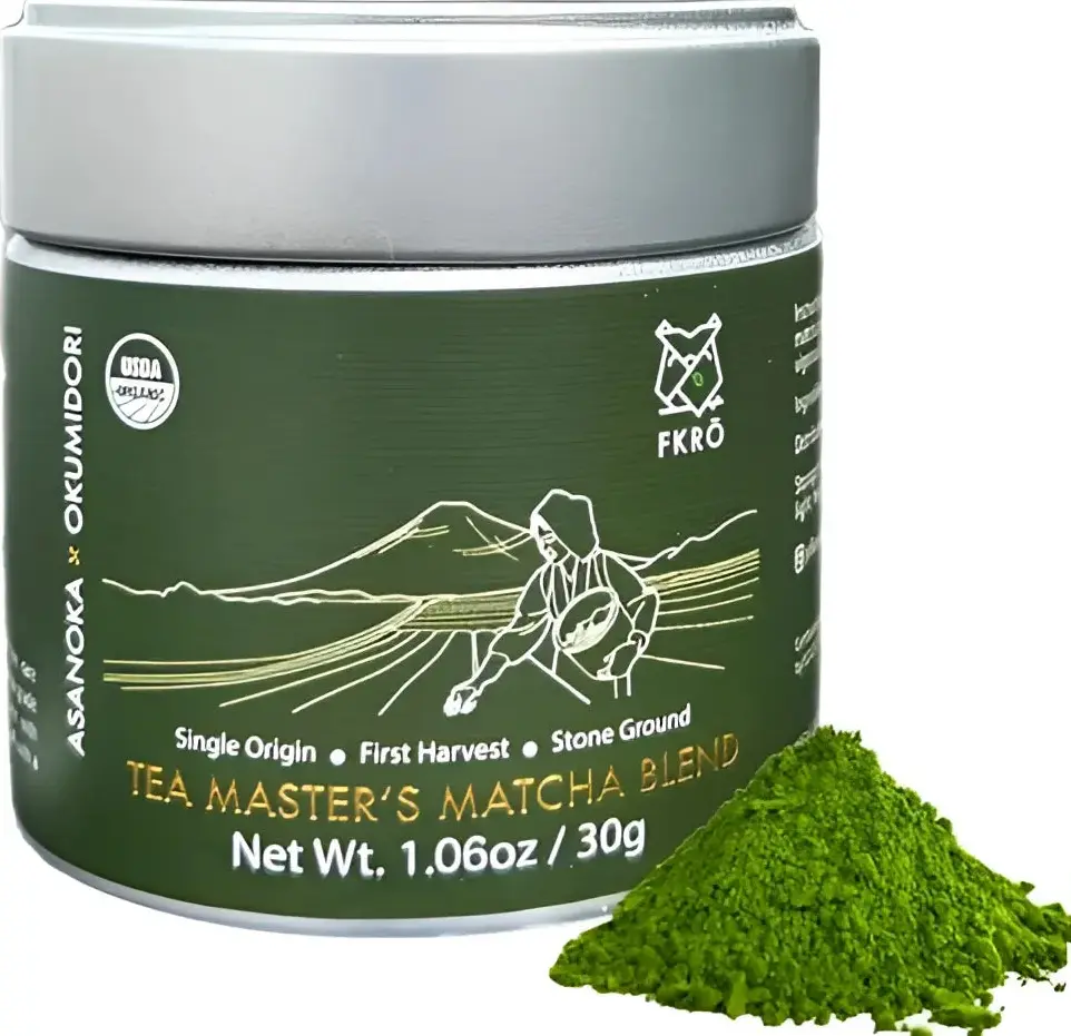 Organic Tea Master's Matcha 30g green container with gray lid beside a mound of green matcha powder