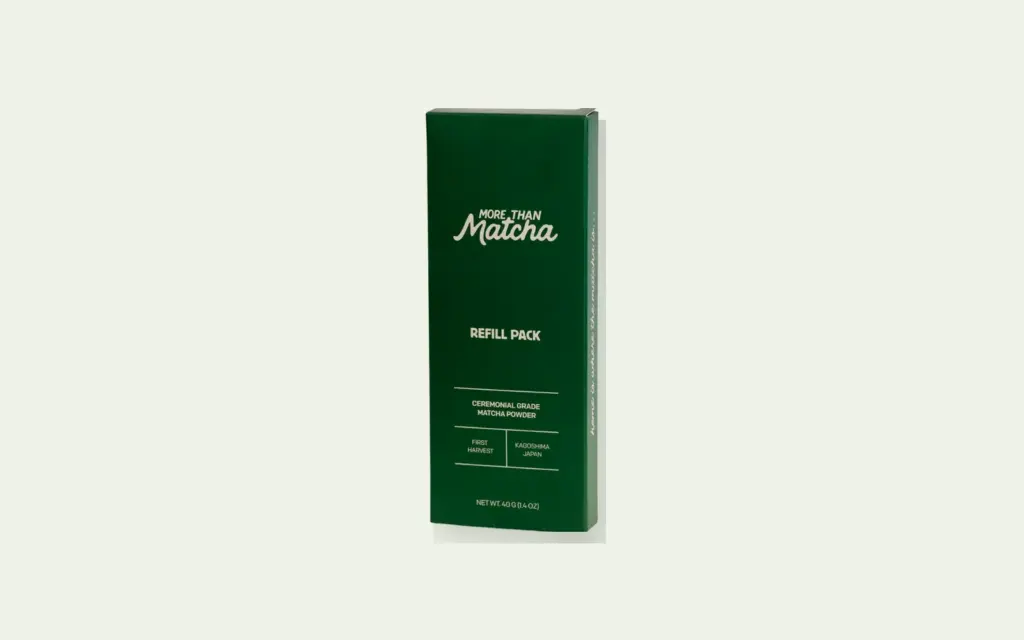 More Than Matcha ceremonial matcha refill pack on a pale green landscape background