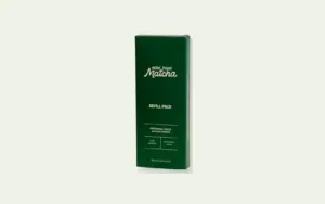 More Than Matcha ceremonial matcha refill pack on a pale green landscape background