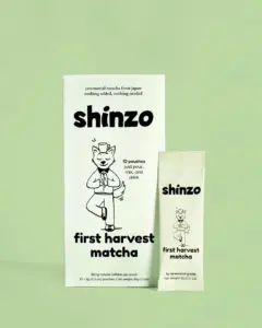 Shinzo First Harvest Matcha box and single-serve pouch on a pale green background