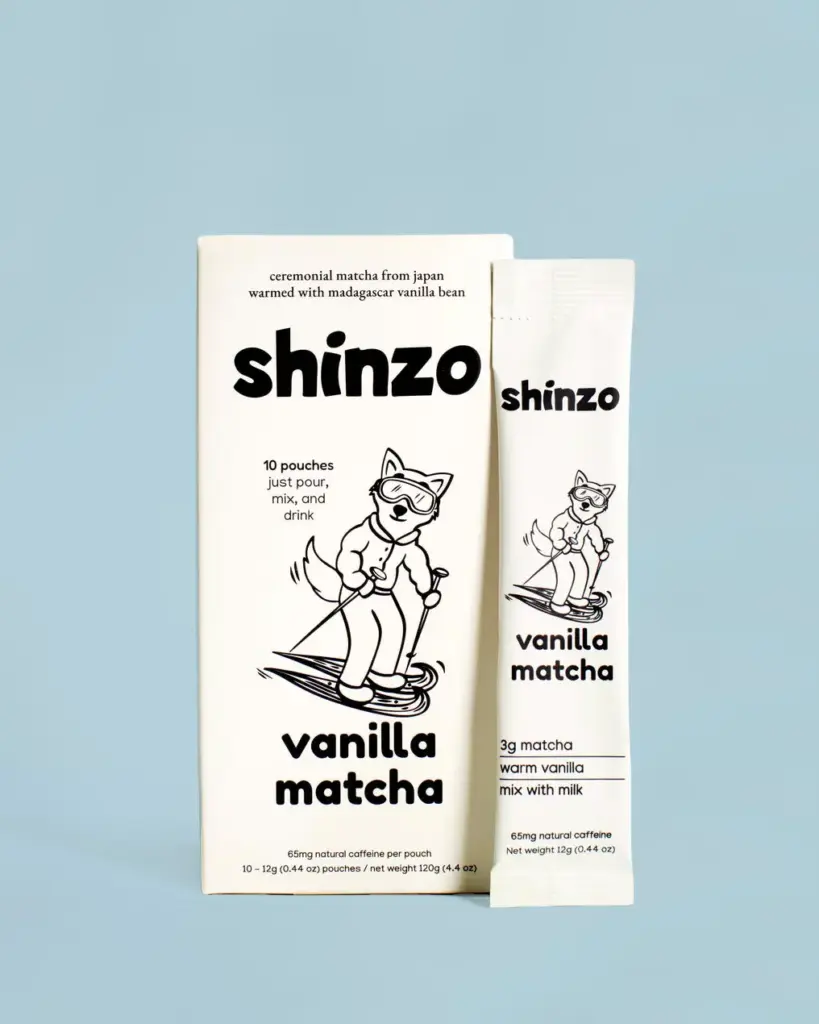 Shinzo Vanilla Matcha box and individual pouch on a light blue background