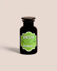 Black Matcha Botanicals jar with a green Early Harvest ceremonial matcha label
